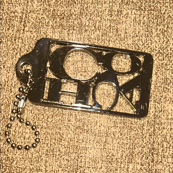 Coach Handbags - Coach 70th Anniversary Metal Hangtag Bag Charm Cutout - Silver Tone